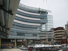 professional industrial abseilers installing architectural features on an Auckland high-rise